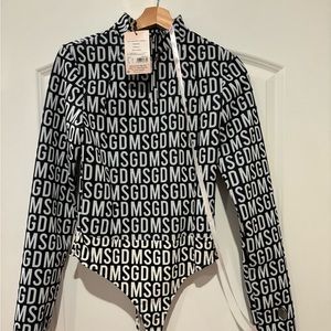 New with tag skiing waterproof bodysuit misguided
